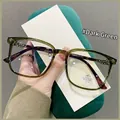 Dark green TR90 glasses frames with tortoiseshell temples and cross metal accents - Dark Green