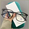 Matte black TR90 anti-blue light glasses with silver cross relief detail on the temples - Matte Black