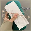 Minimalist TR90 square eyeglasses in transparent gold resin with sleek metal temples - Transparent Silver (C5)