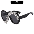 Occhiali da sole rotondi neri oversize con strass di cristallo asimmetrici C1 - Montatura Nera Lenti Grigie (C1)