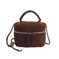 Brown suede quilted box bag with silver chain strap and dual zippers in studio lighting - Caramel color