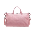 Detailed view of the pink Intrecciato woven texture on a large travel duffel bag for women - Pink