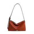 Vintage reddish-brown leather underarm bag with silver oval metal detail and adjustable strap - Caramel color