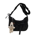 Black fabric crossbody bag with ruched strap, bow detail and cute puppy charm accessory - Black