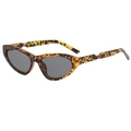 Retro cat-eye sunglasses with tortoise shell frame and twisted temples in dark grey lenses - Demi Grey