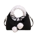Black suede handbag with white faux fur trim and decorative plush pom-poms - Black