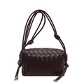 Luxury dark brown woven leather crossbody pillow bag with chic knot strap detail - Coffee