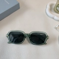 Stylish translucent dark green resin sunglasses with rivet accents and UV400 lenses - Green