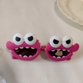 Pink monster-shaped polarized sunglasses for kids with large eyes and toothy smile - Rose Red