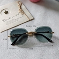 Rimless oval sunglasses with gold metal temples and faceted gray lenses, 28g weight - Green