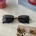 Gafas de sol sin montura con lentes negras degradadas y patillas doradas - Gris Completo