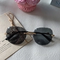 Fashion rimless sunglasses with grey diamond-cut lenses and gold metal temples - Full Grey