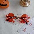 Frameless skull glasses with translucent red lenses and gold metal bridge for Halloween - Skeleton Bone Red