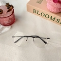 Gafas ovaladas al aire minimalistas con montura de metal negro fino y lentes transparentes - Negro
