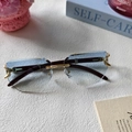 Retro randlose Sonnenbrille mit blauen Verlaufsgläsern und braunen Holzbügeln - Blau