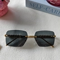 Gafas de sol retro sin montura grises con montura de metal dorado y detalles de remaches - Gris Completo