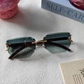 Rimless vintage sunglasses with gradient green lenses and golden C-shaped metal accents - Green