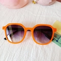 Bright orange round children's sunglasses with purple gradient lenses for UV protection - Jelly Orange
