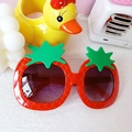 Cute red strawberry shaped sunglasses with green leaf accents for kids and parties - Red
