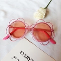 Pink sunflower flower shaped children's sunglasses with orange tinted round lenses - Pink Frame Orange Lens