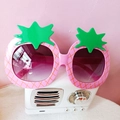 Pink pineapple shaped sunglasses with gradient lenses and green leaf detail for kids - Pink