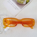 Rechthoekige smalle zonnebril van transparant oranje hars met een modern minimalistisch design - Transparant Oranje