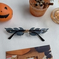 Frameless black flame shaped sunglasses with gold metal bridge for party wear - Flame Black