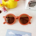 Kids round matte brick red sunglasses with UV protection lenses for boys and girls - California Orange
