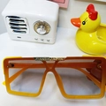 Square orange transparent kids sunglasses with gradient lenses and gold nose bridge - Orange