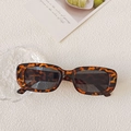 Vintage tortoiseshell rectangular sunglasses with grey lenses on a white textured backdrop - Leopard / Grey Lenses