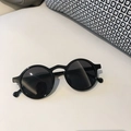 Retro round frame sunglasses in glossy black finish with dark UV protective lenses - Black