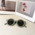 Modern round kids sunglasses in matte morandi green finish with dark lenses - Green