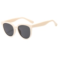 Occhiali da sole cat-eye color crema con lenti grigio scuro per un look street minimalista - Beige/Lenti Grigie