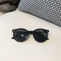 Occhiali da sole rotondi neri per bambini con lenti scure a protezione UV - Nero
