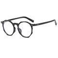 Montatura occhiali nera poligonale con rivetti argentati e lenti anti-luce blu - Nero Lucido