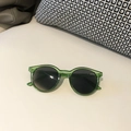 Retro round kids sunglasses featuring transparent green frames and dark grey lenses - Transparent Green