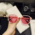 Retro small frame sunglasses with cream frame and pink lenses plus metal studs - Pink