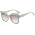Occhiali da sole cat eye oversize con montatura verde menta e lenti sfumate rosa - Blu Gelatina