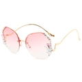 Modieuze randloze zonnebril met roze gradiëntglazen en golfvormige pootjes met diamanten - Gouden frame / Dubbele roze lenzen