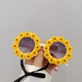 White round frame children's sunglasses with yellow sunflower decor and black ribbon - Yellow Daisy
