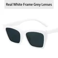 Retro cat-eye sunglasses featuring a solid white frame and dark grey square lenses - Solid White Frame Gray Lens