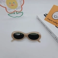 Oval sunglasses in champagne translucent frames with dark lenses for retro hip-hop style - Milk Tea
