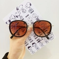 Kids vintage oval sunglasses with black frames, amber lenses, and gold metal accents - Round Style / Black Frame Tea