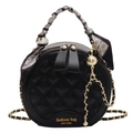 Chic black round quilted crossbody bag with gold chain and silk scarf handle detail - Black