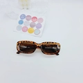 Macro view of retro leopard print children sunglasses with UV-protective brown lenses - Leopard Print