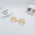 Detailed view of round frame kids sunglasses with pearl trim and gradient lenses - White Frame Light Tea
