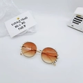 Detailed view of round metal children sunglasses with pearl trim and gradient lenses - Silver Frame Brown Lens