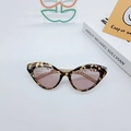 Cat eye sunglasses with tortoise frame and gold chain detail on top of lenses - Tortoiseshell Frame Tea Lens