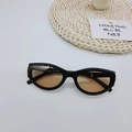 Occhiali da sole ovali neri alla moda con lenti marroni e design stile candy - Montatura Nera Lenti Tè