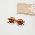Detail of round frame kids sunglasses with two-tone design and brown tinted lenses - Orange and White Patchwork